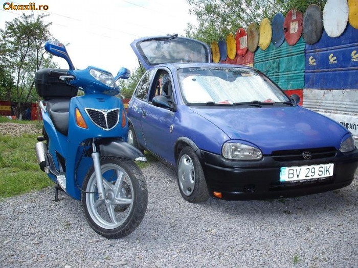oper corsa & scuter honda foto mare