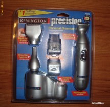 REMINGTON APARAT RAS,TUNS,BARBA,NAS,URECHI PG 200/PG-200 FARA FIR TRANSPORT GRATUIT PRIN POSTA SAU DOAR 9.9 LEI PRIN FAN COURIER foto